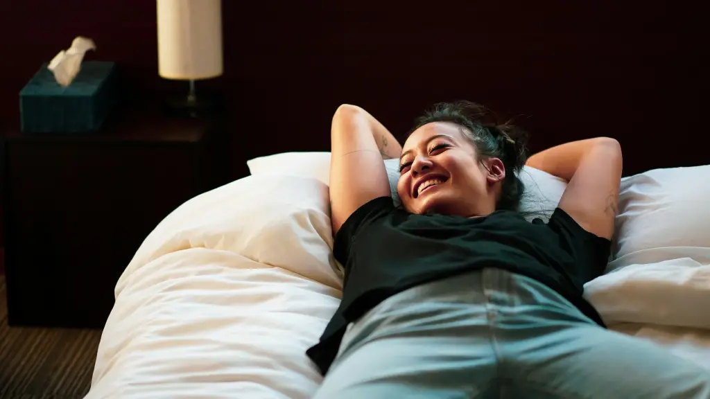 Happy person on bed